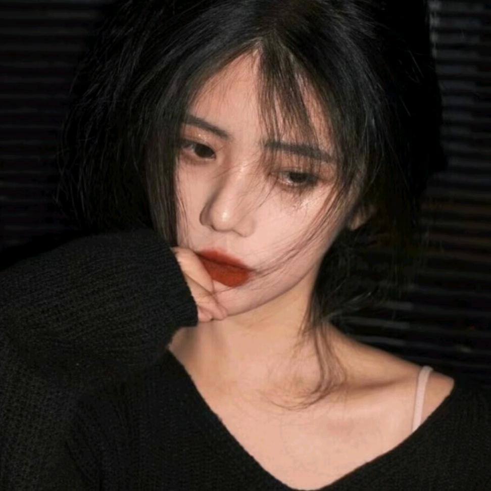 女二