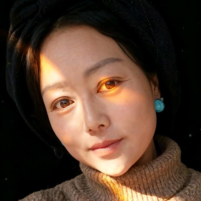 👩