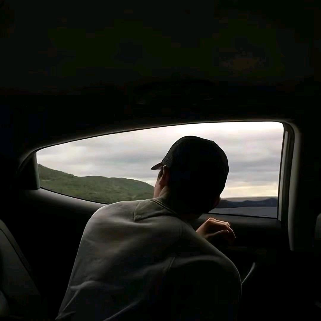 T.