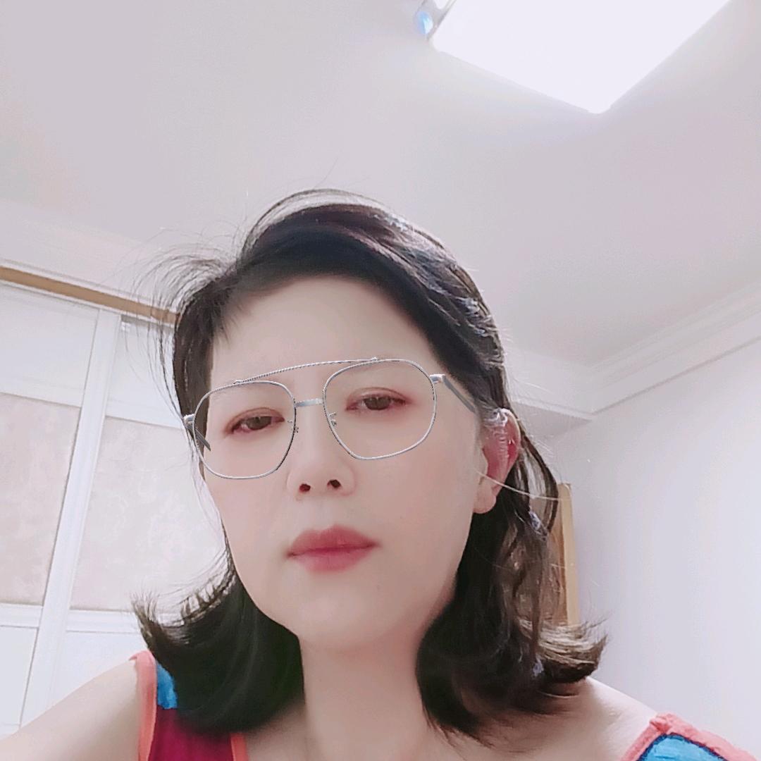 华