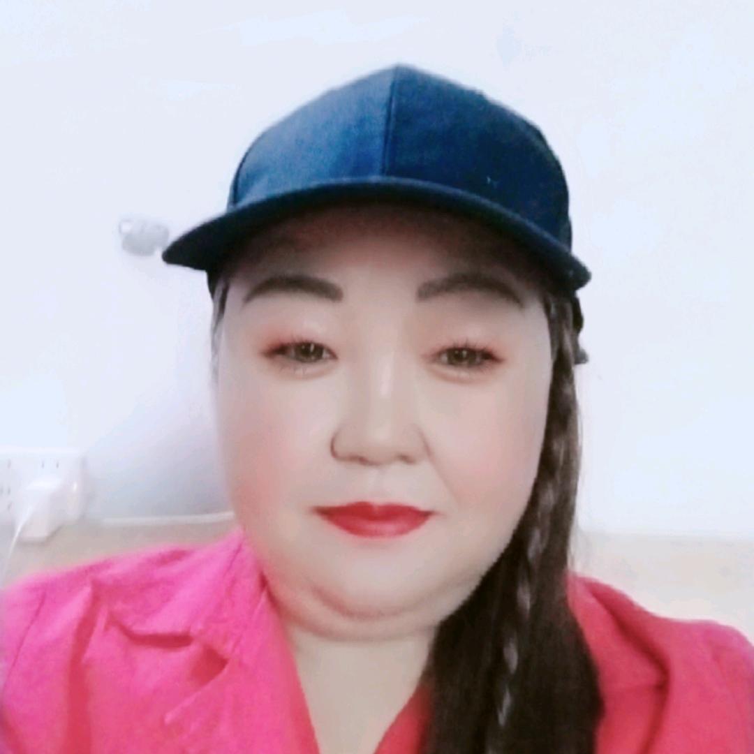 梁爱荣。