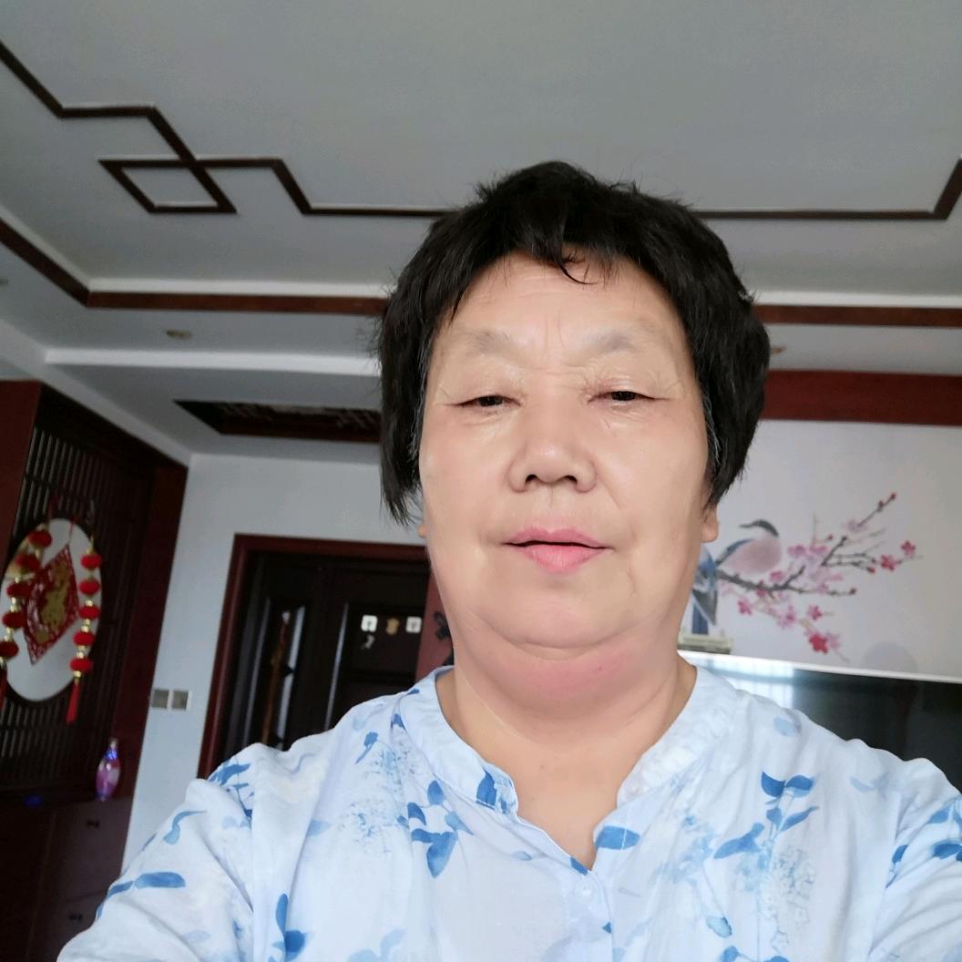 阴建英