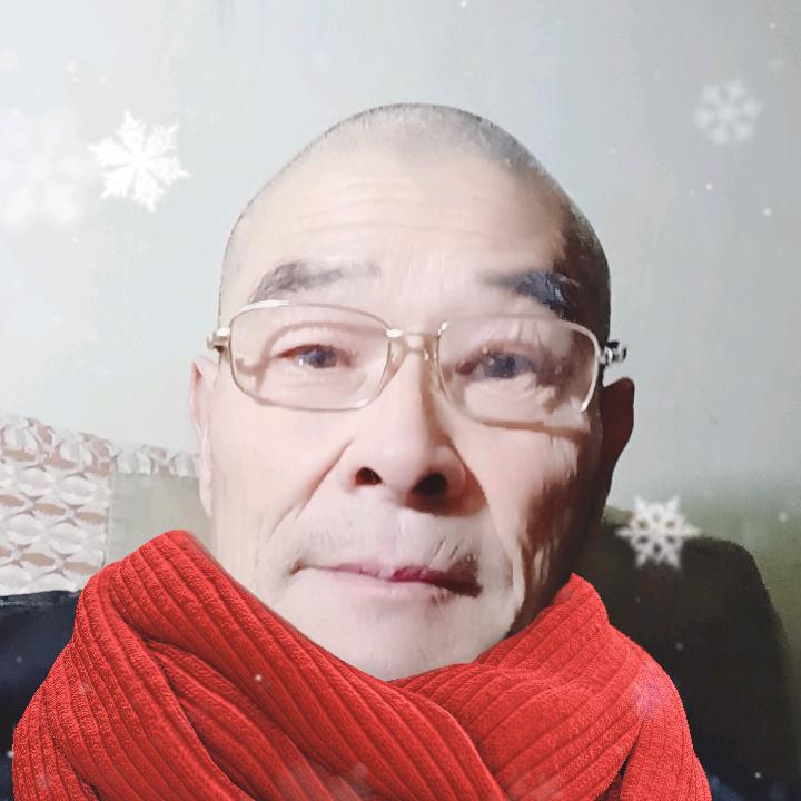 張同國