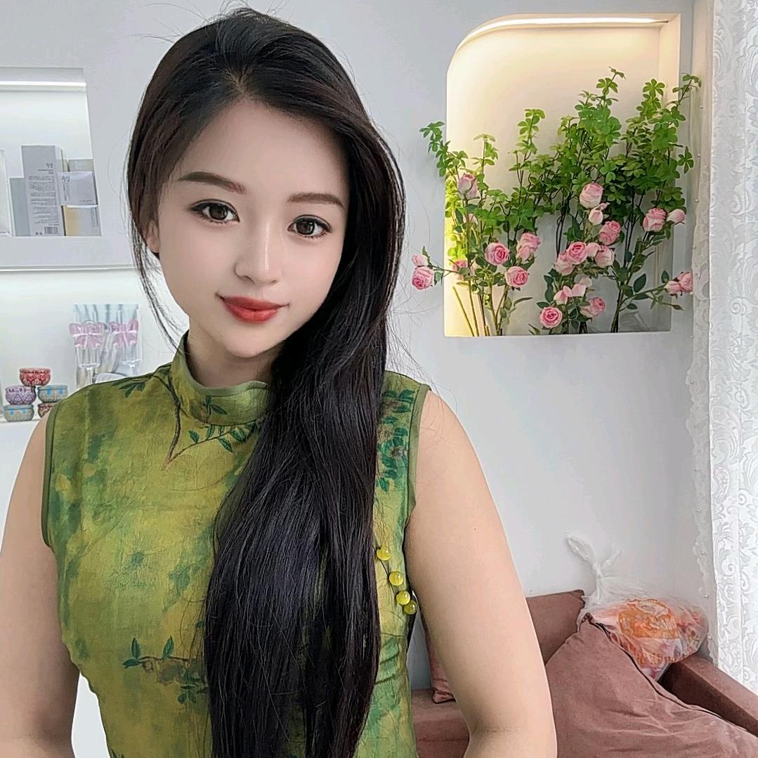 嫣然