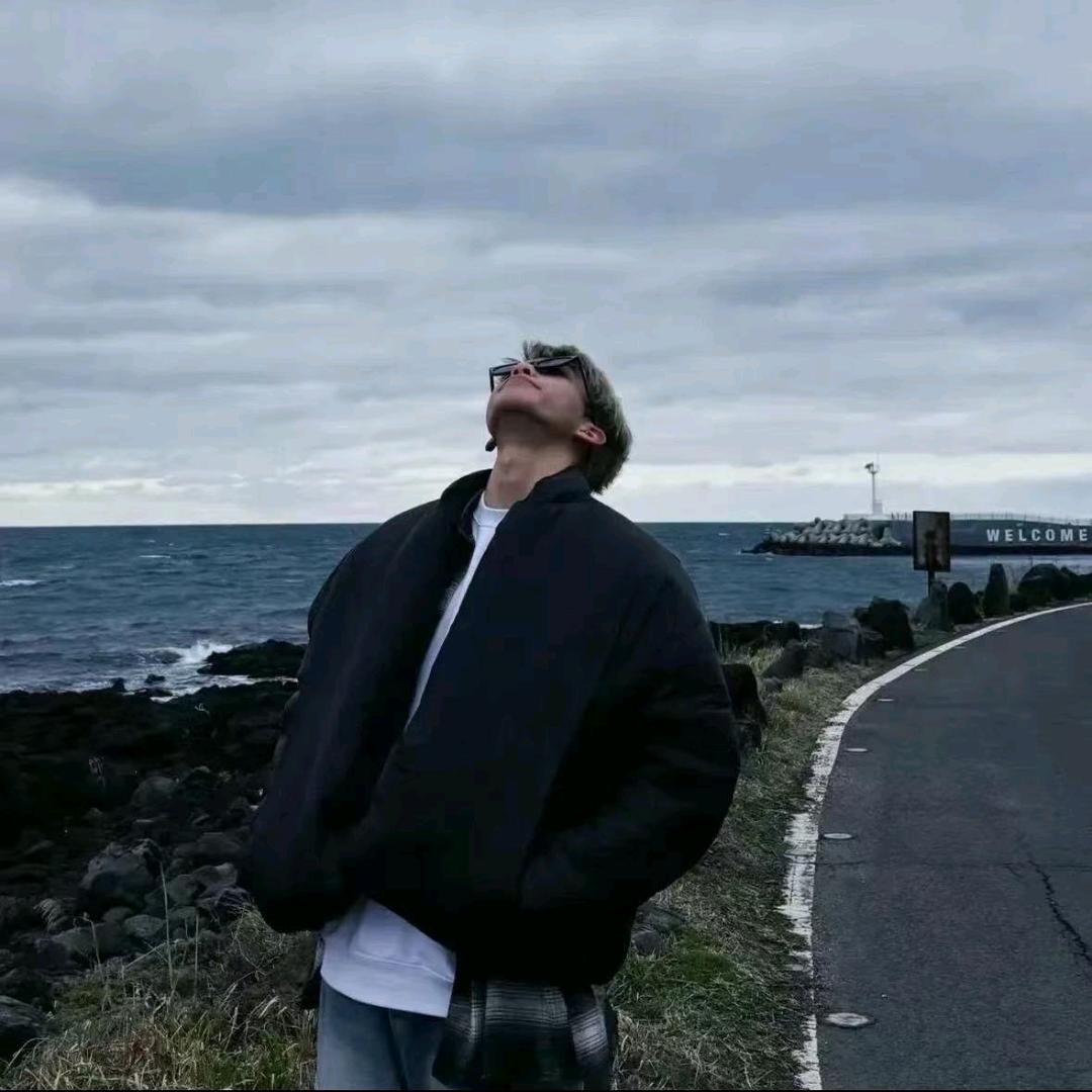 L.