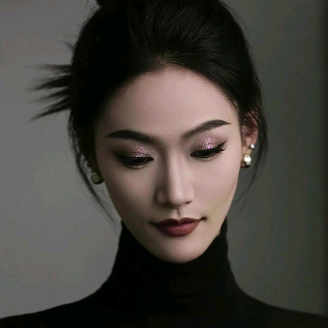 T.