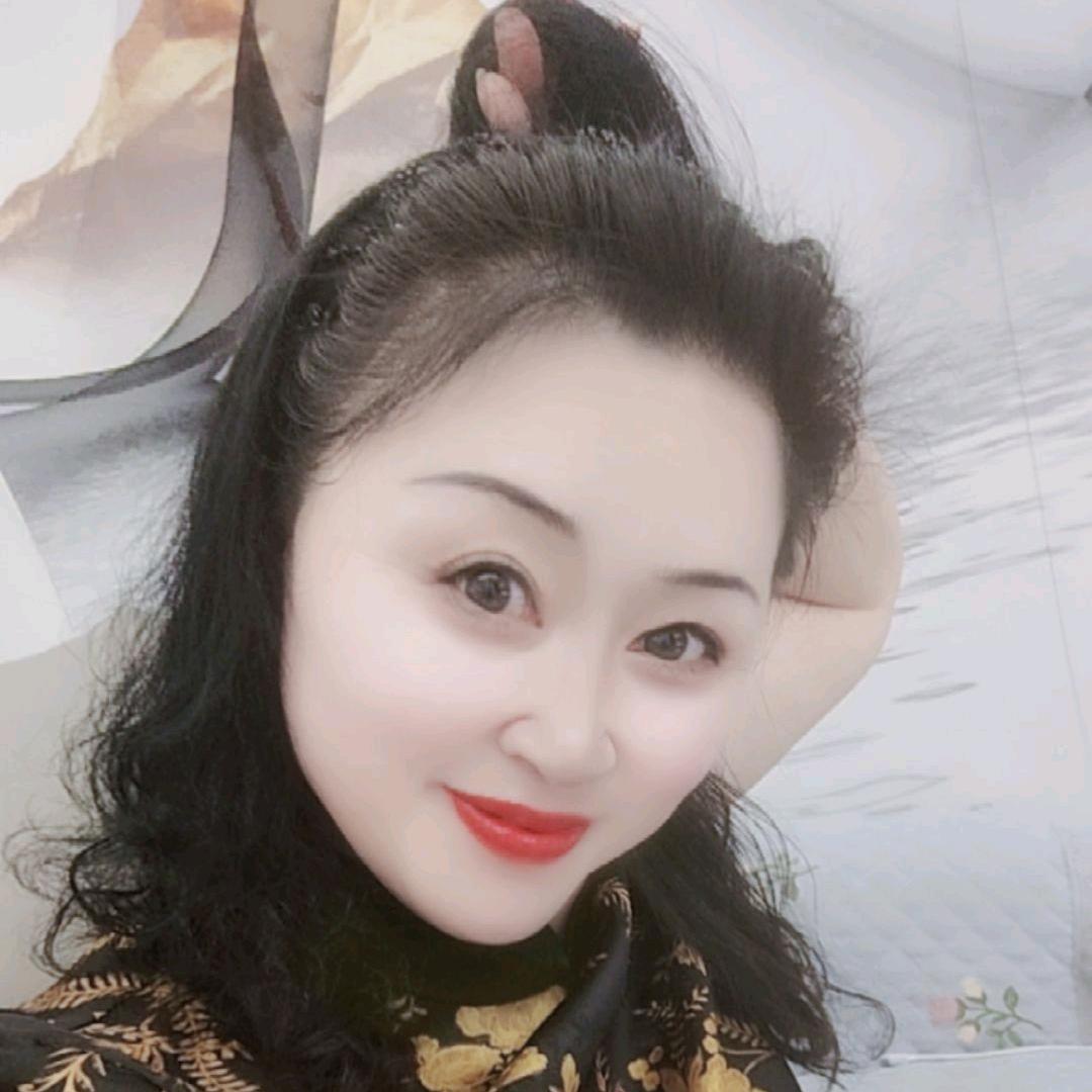 淡然一笑