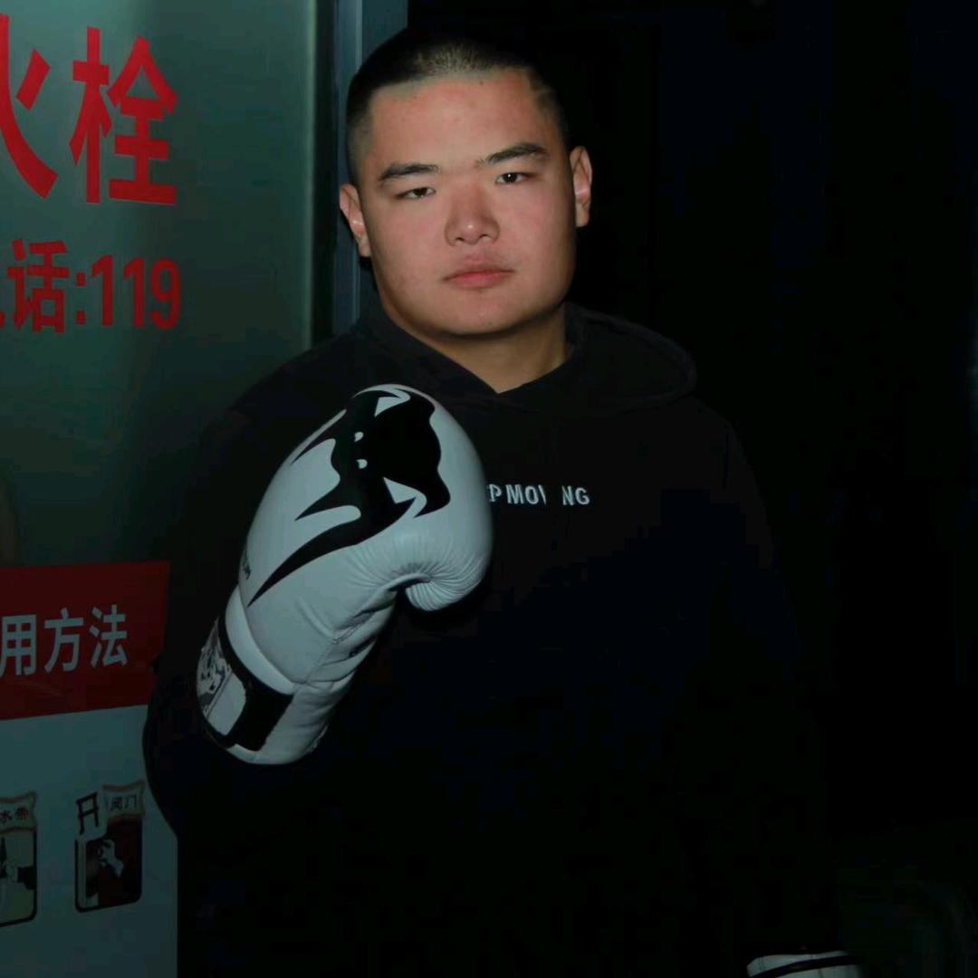 大胃图阿(卖烤肠的拳击手)
