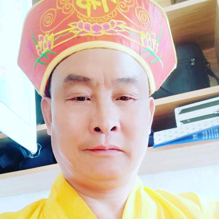 单亲爸爸庹掌坛先生