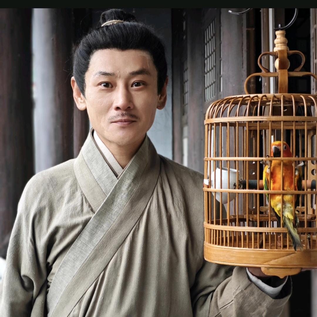 然仔训鸟鹦鹉