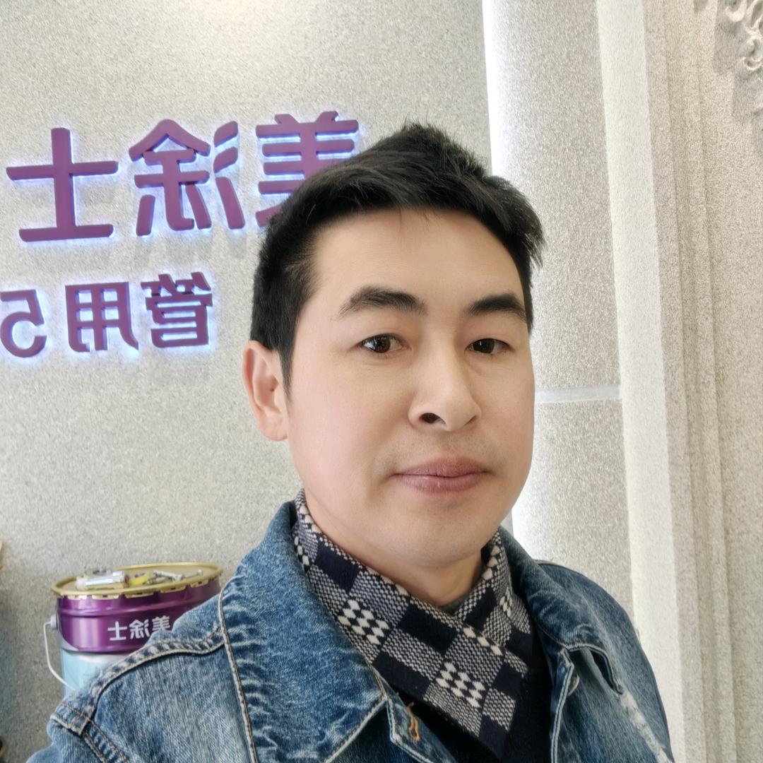 文成做外墙仿石漆的老江