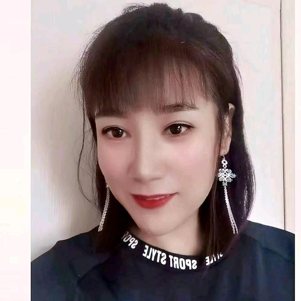 晓艺.