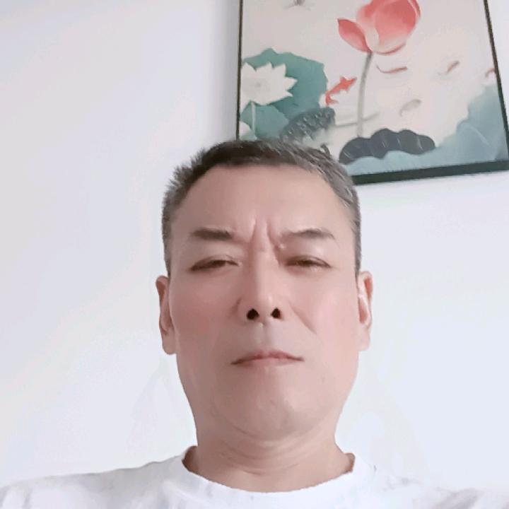 顾建新