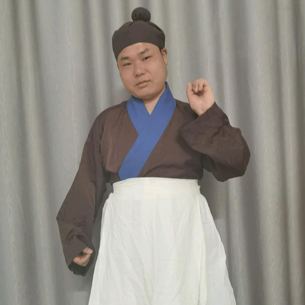 不愿喝药的武大郎