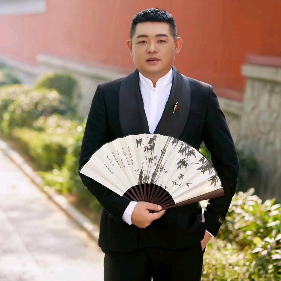 李