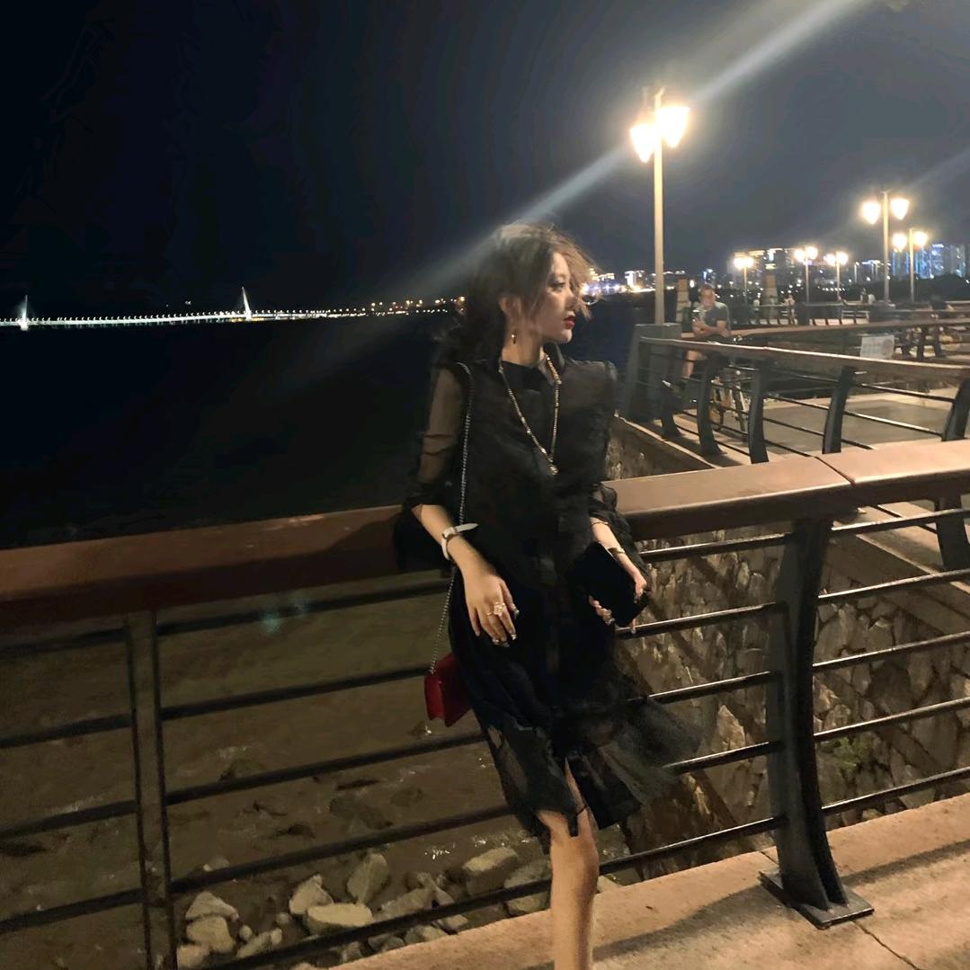 李香兰.