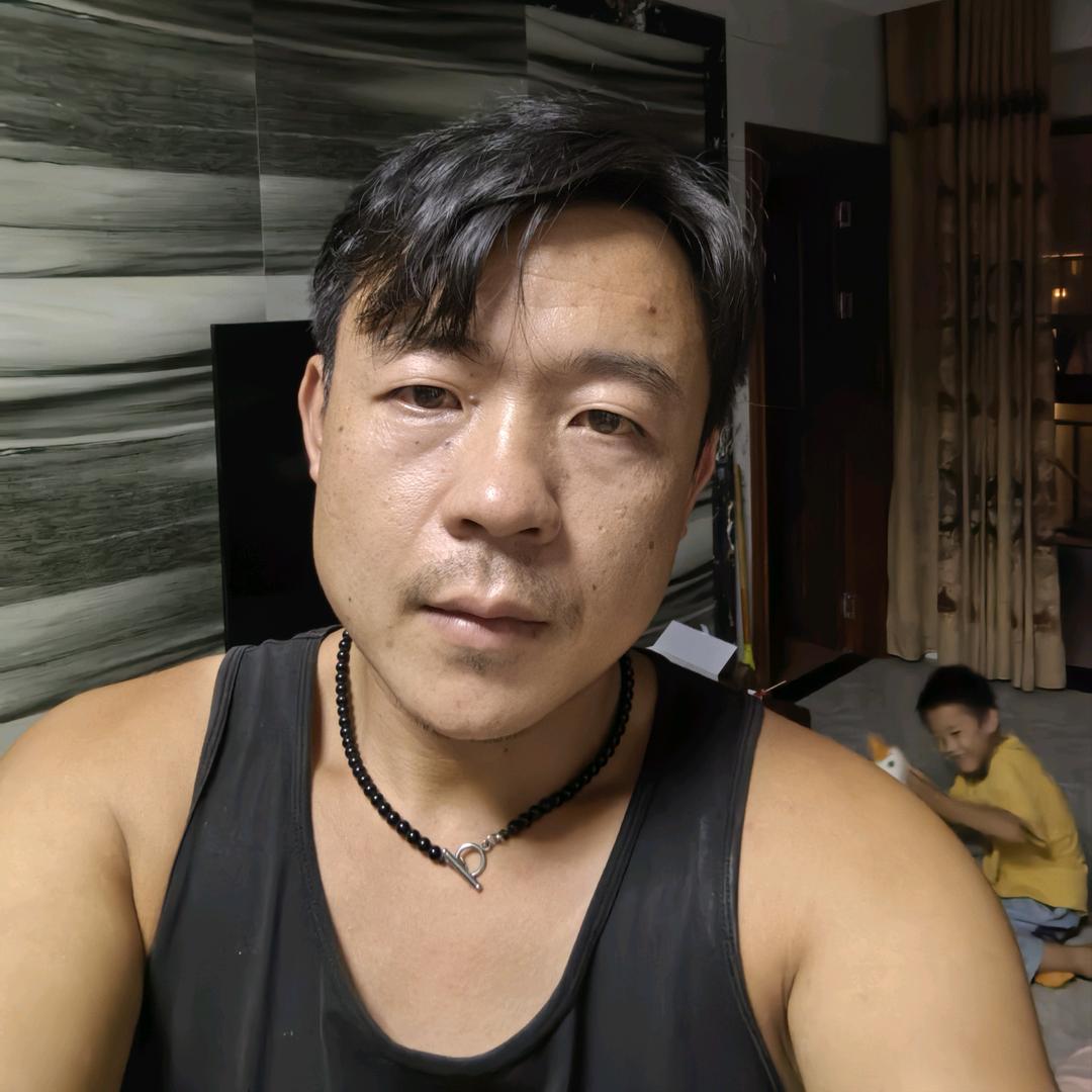 傅光明