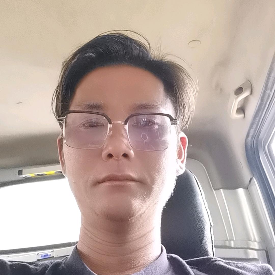劉