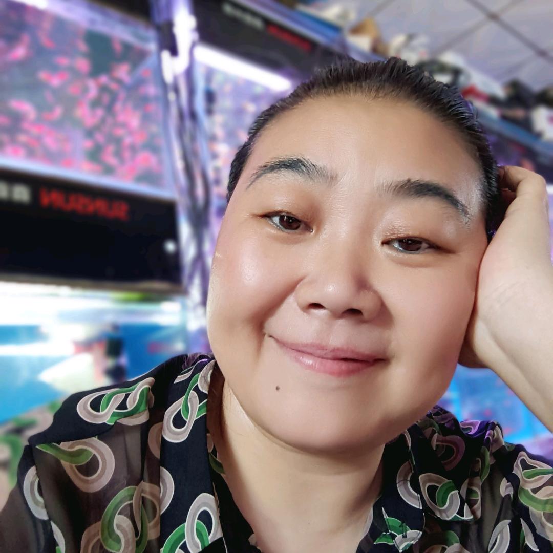 在兖州开水族馆的冯姐