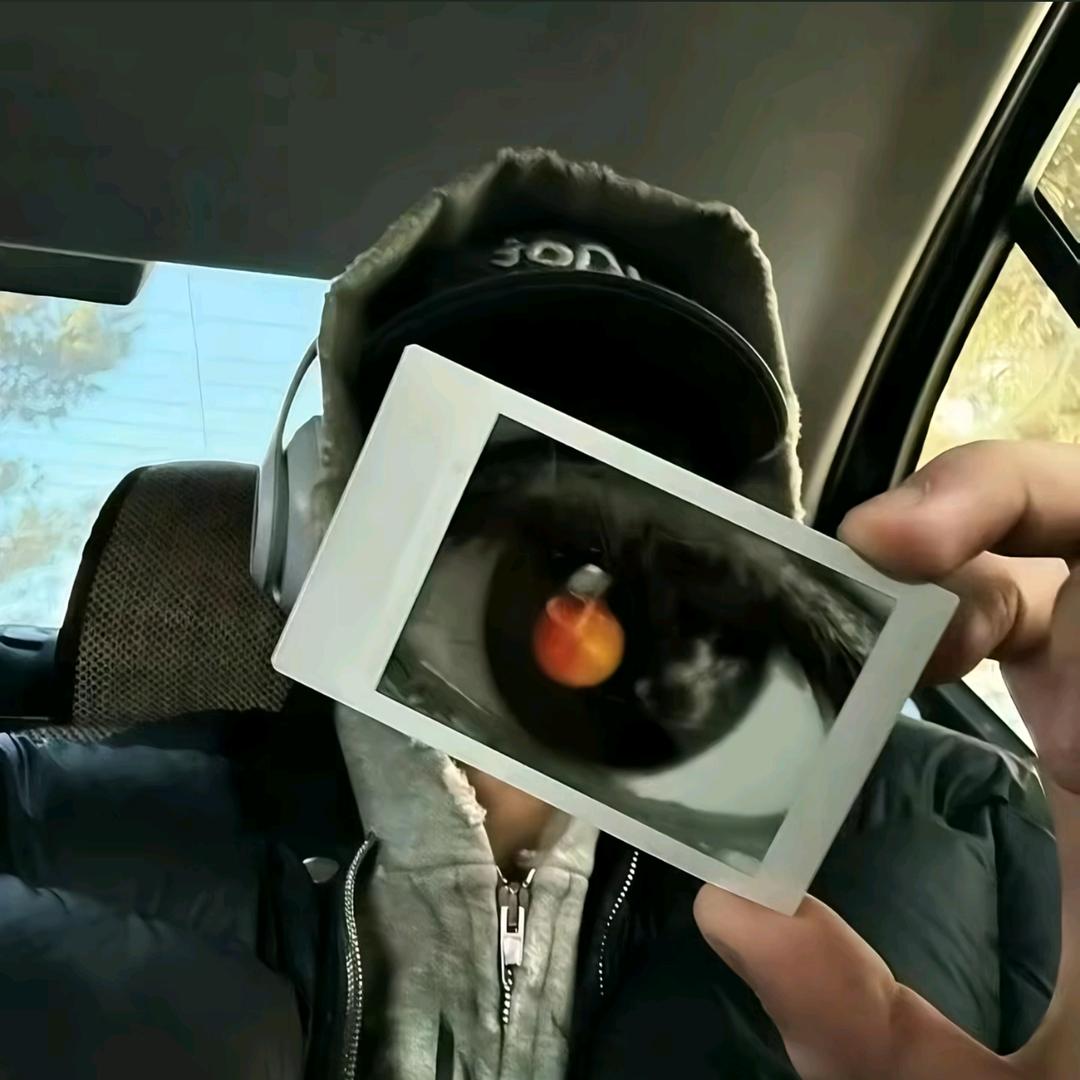 （@）