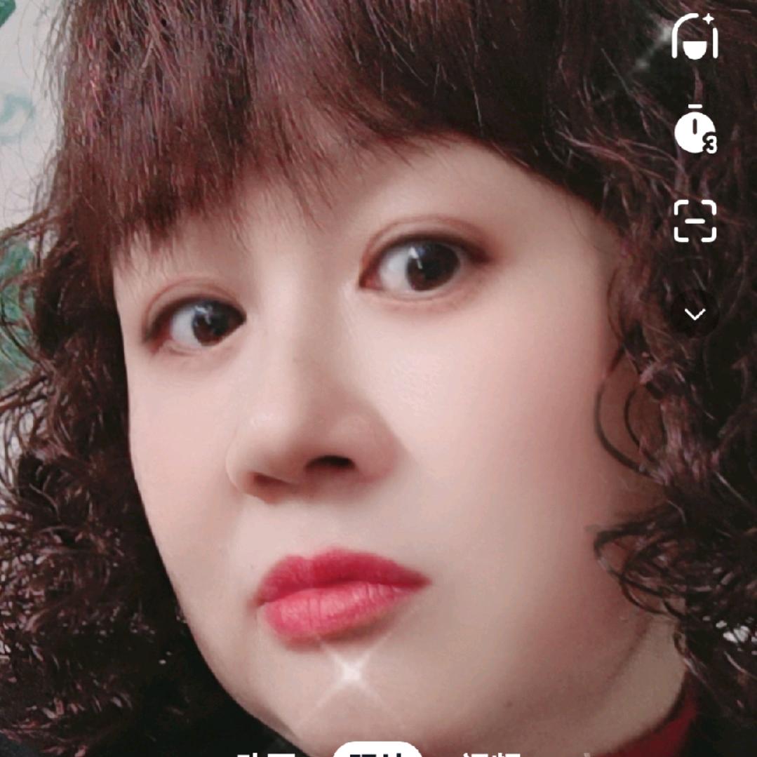 李梅.