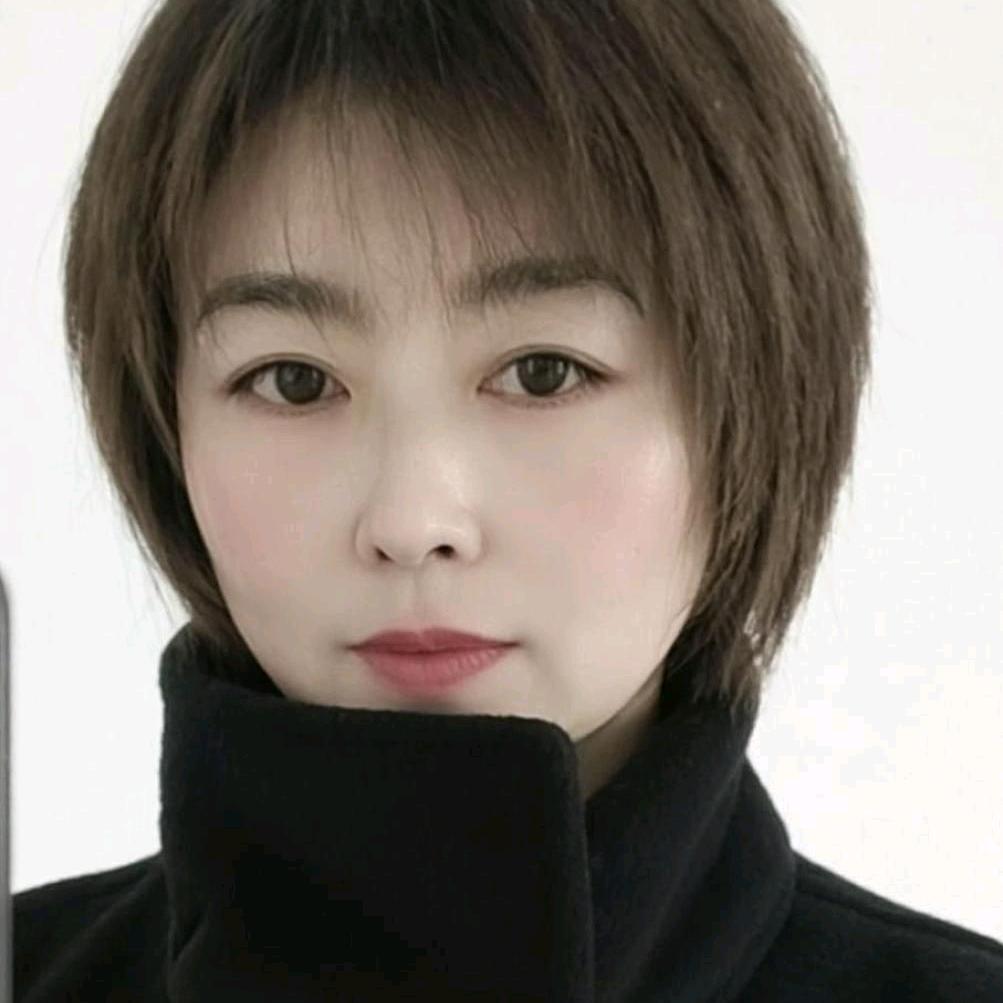 娜.