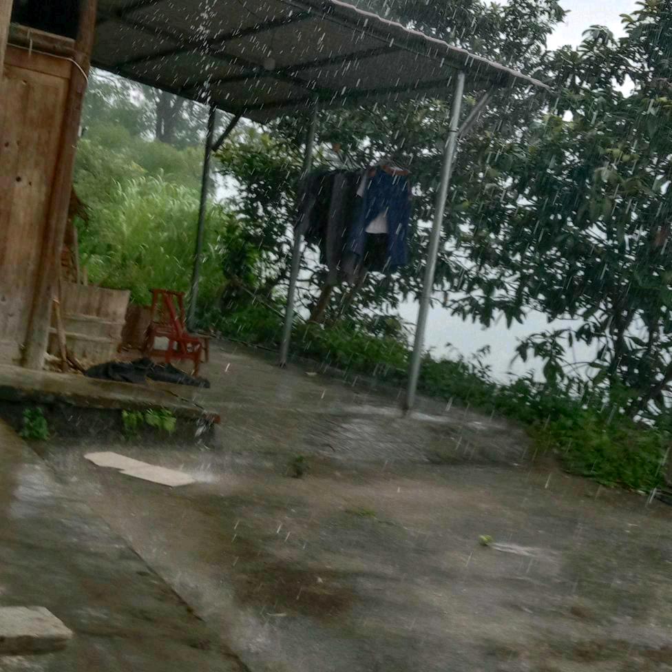 太阳坪村九纽约我罗