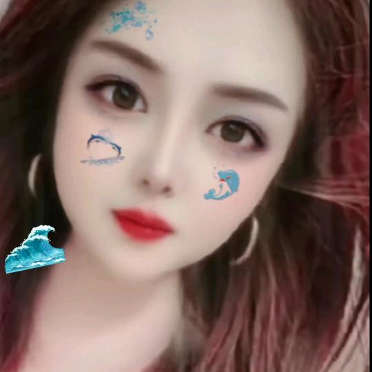 何丽.