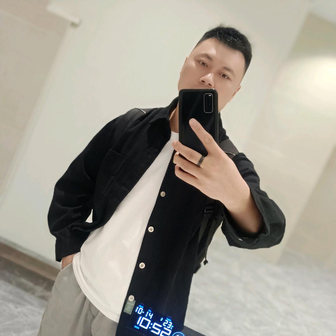 不是张先生