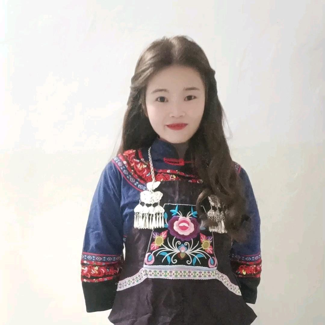 @~W