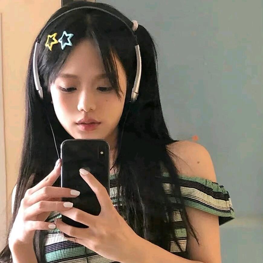 T.