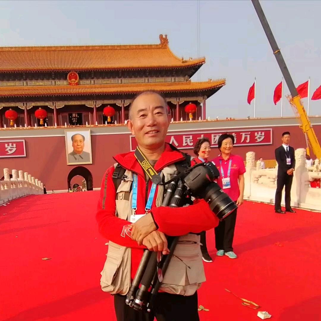 国家高级摄影师毛会彬