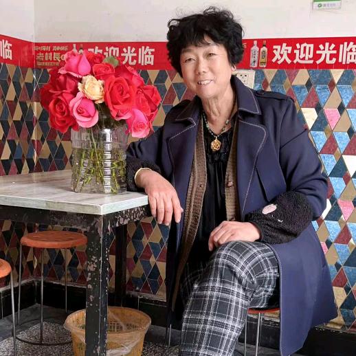 张灿美