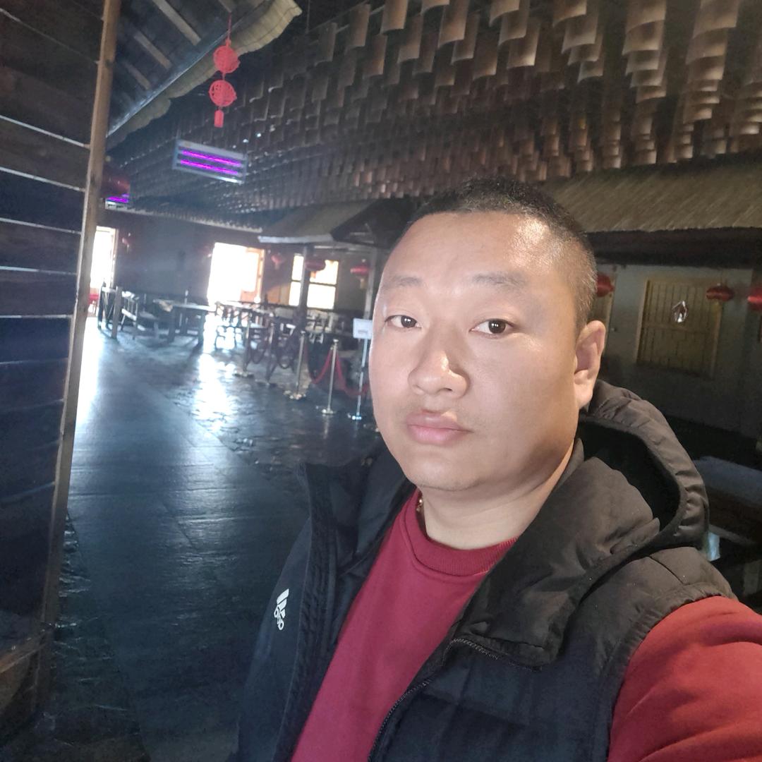 长白山万达陈家大院碳火烤全羊