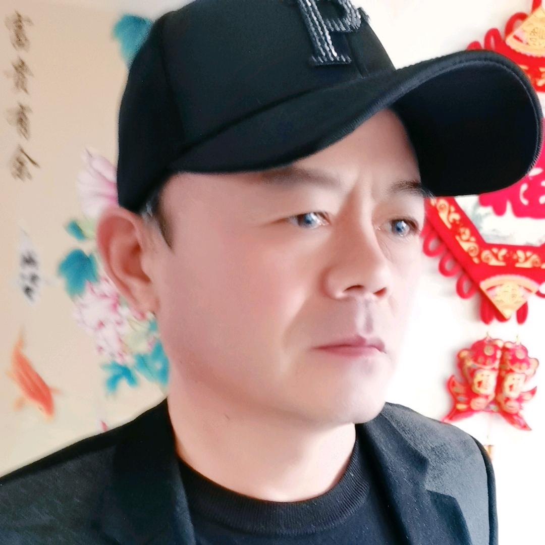 劉