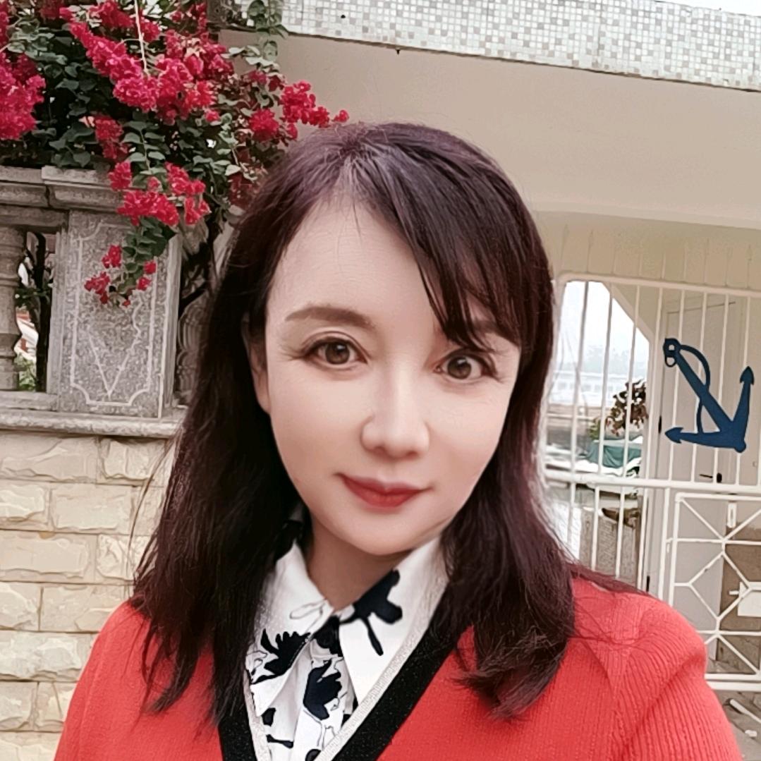 嫣然