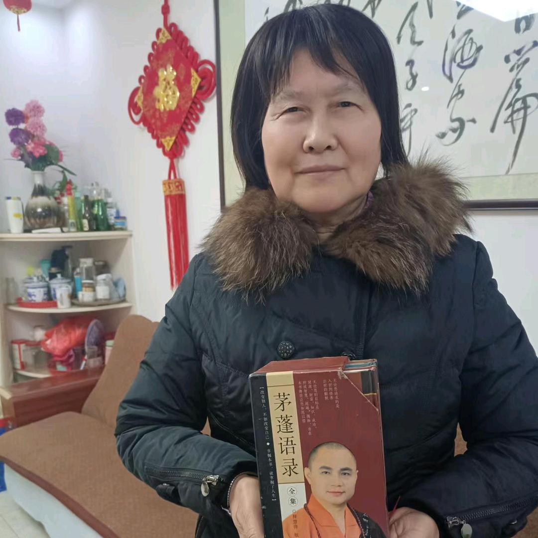 尹雪梅(法名:释宏智)