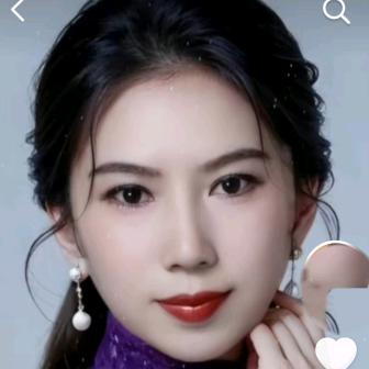 嫣然