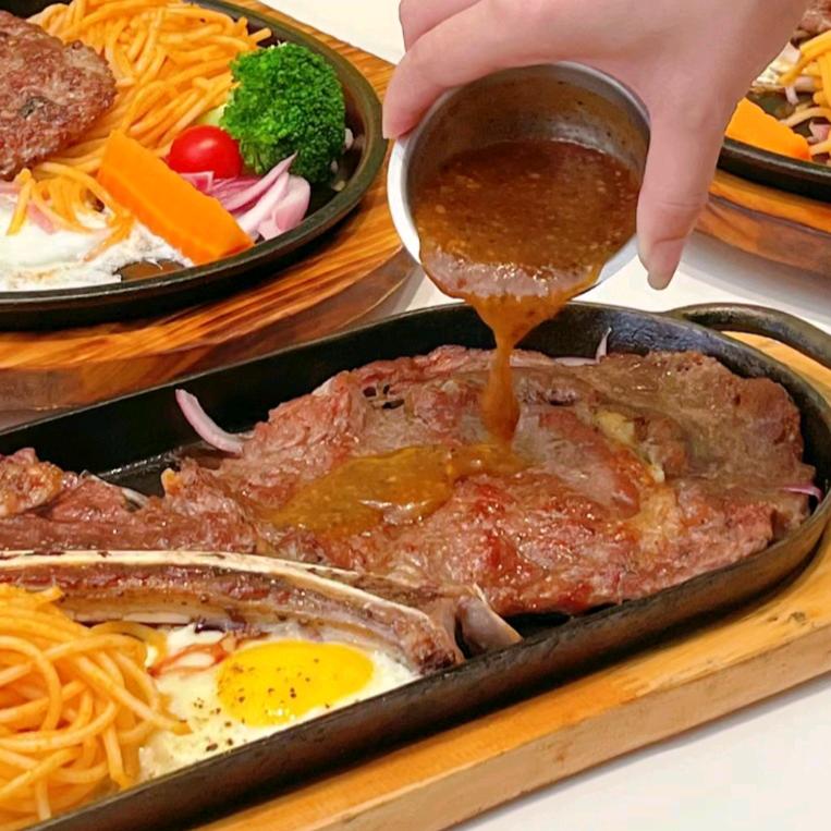 小金努力做牛扒