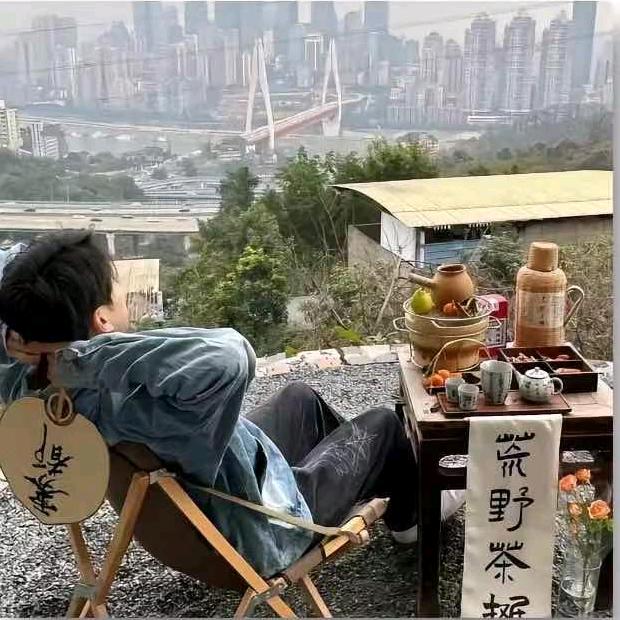 某某