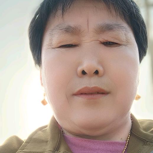 吴素英