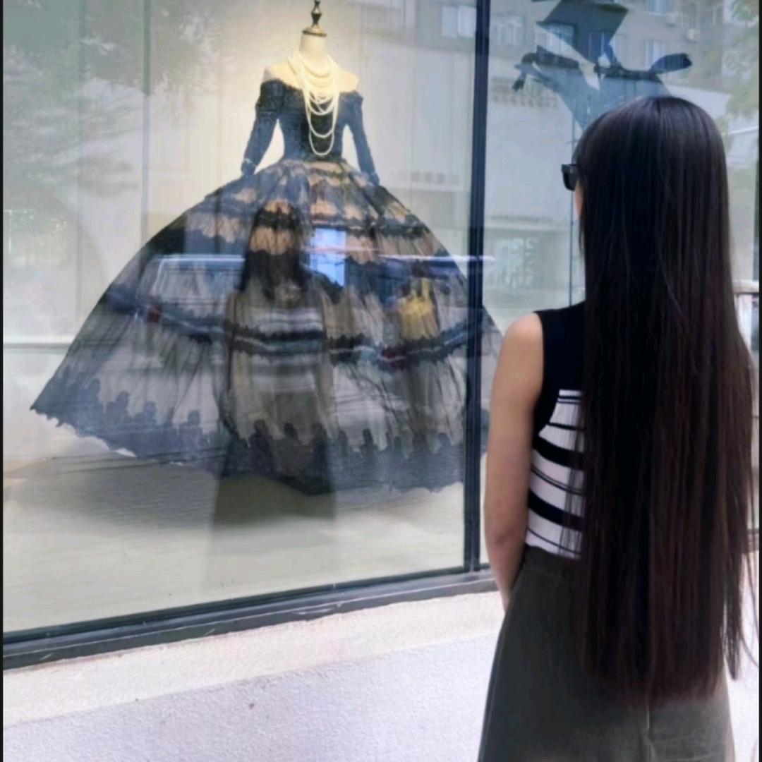 妮.