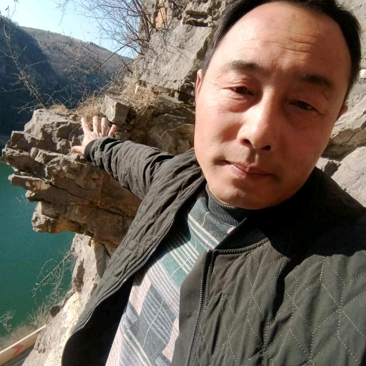 葛志明