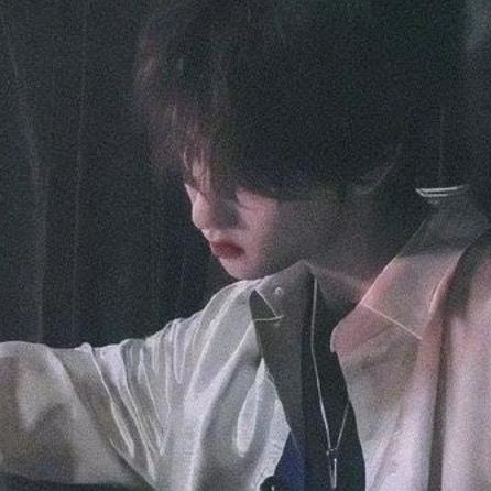 『~』