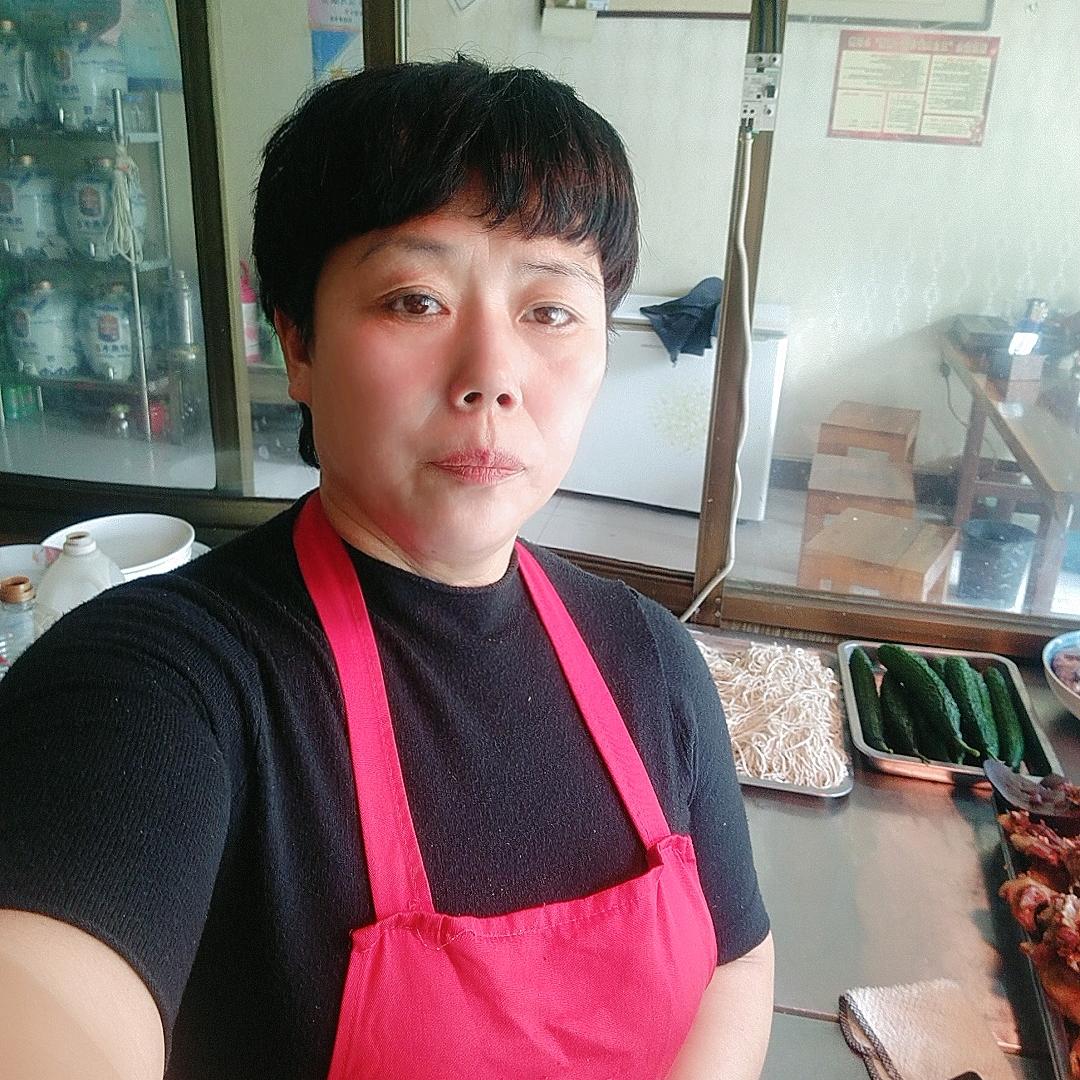 战伟熟肉店老板娘