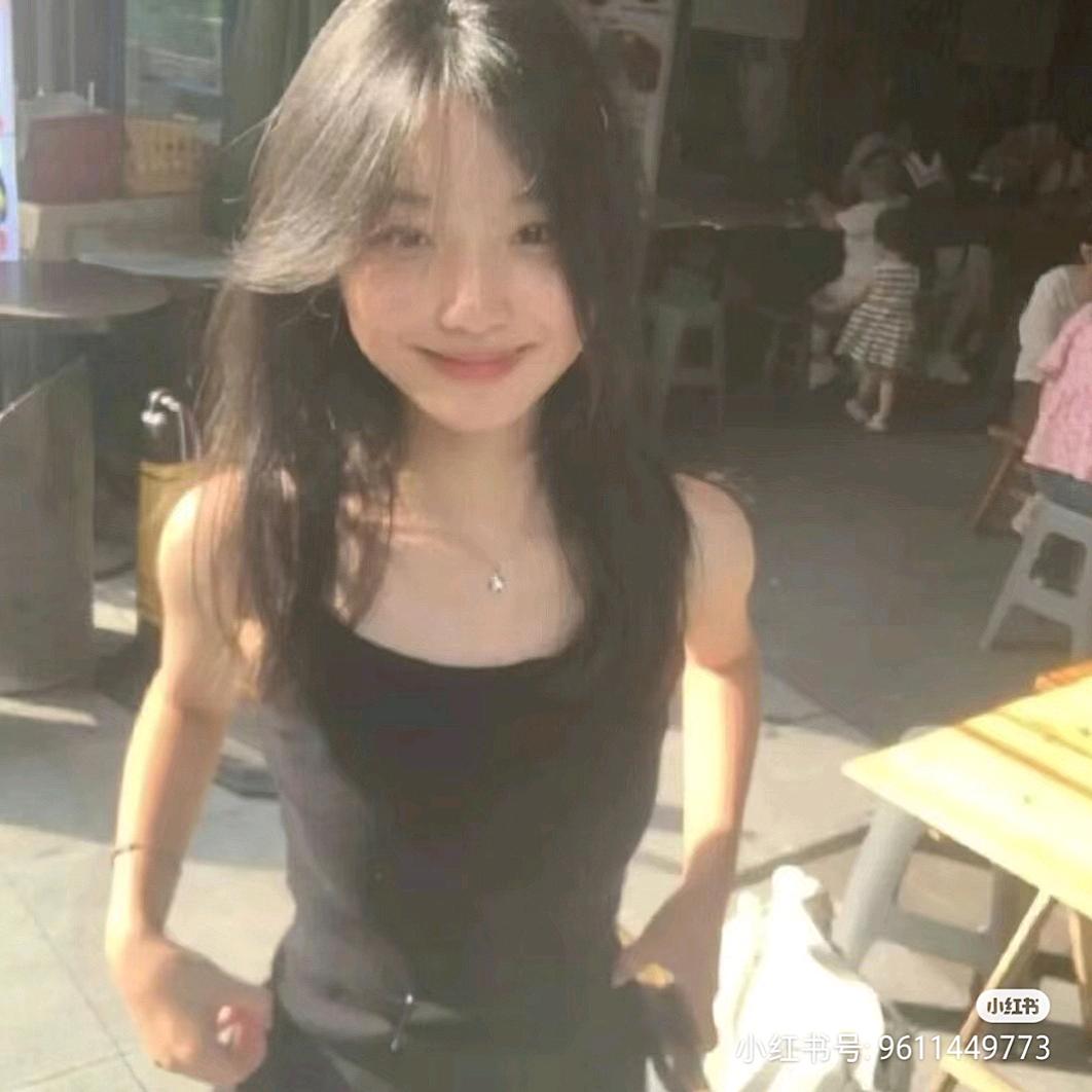 T.
