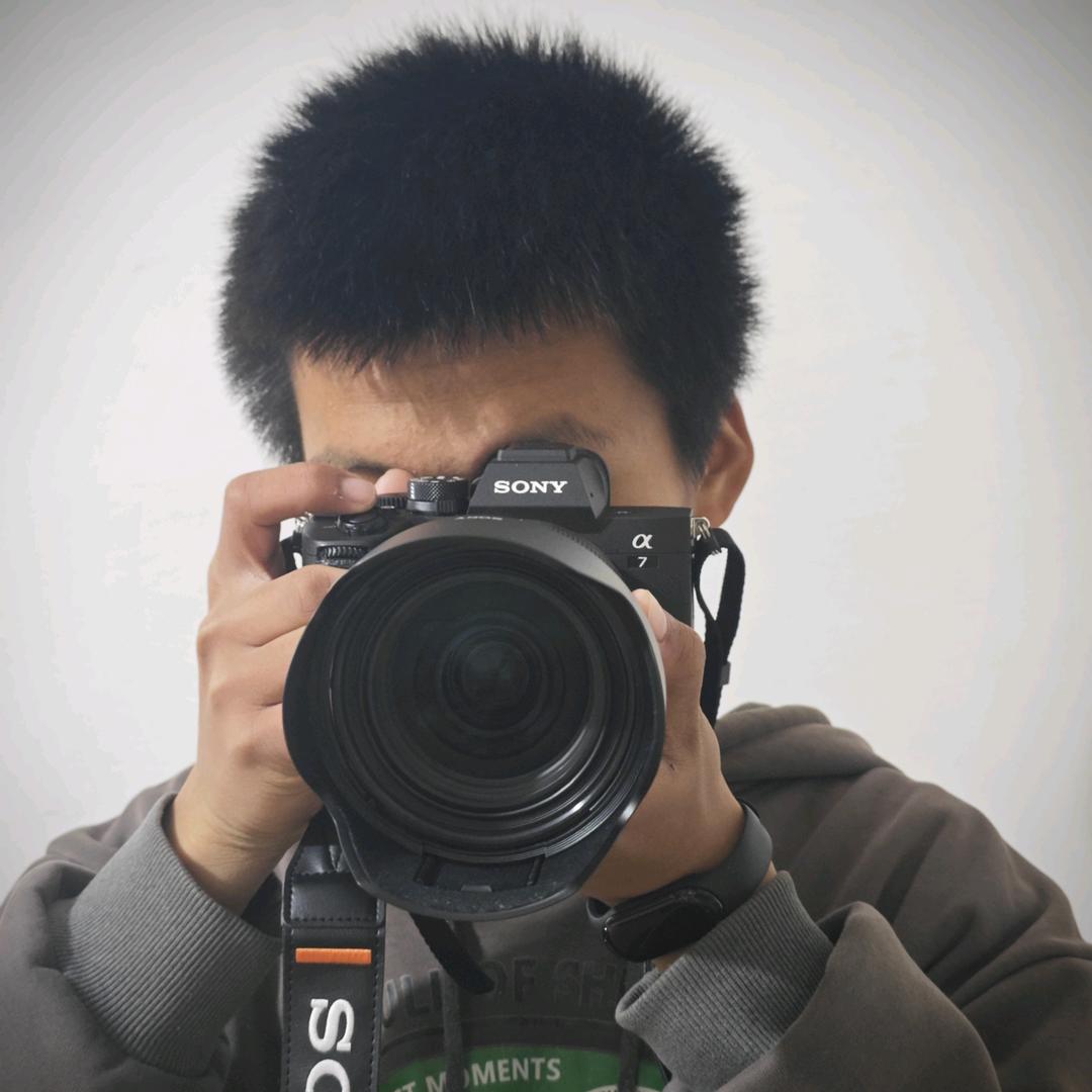 小邵同学📷.