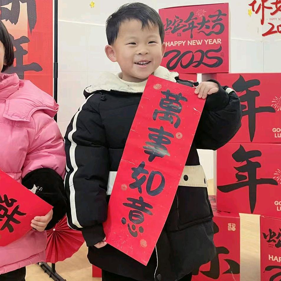 張尐