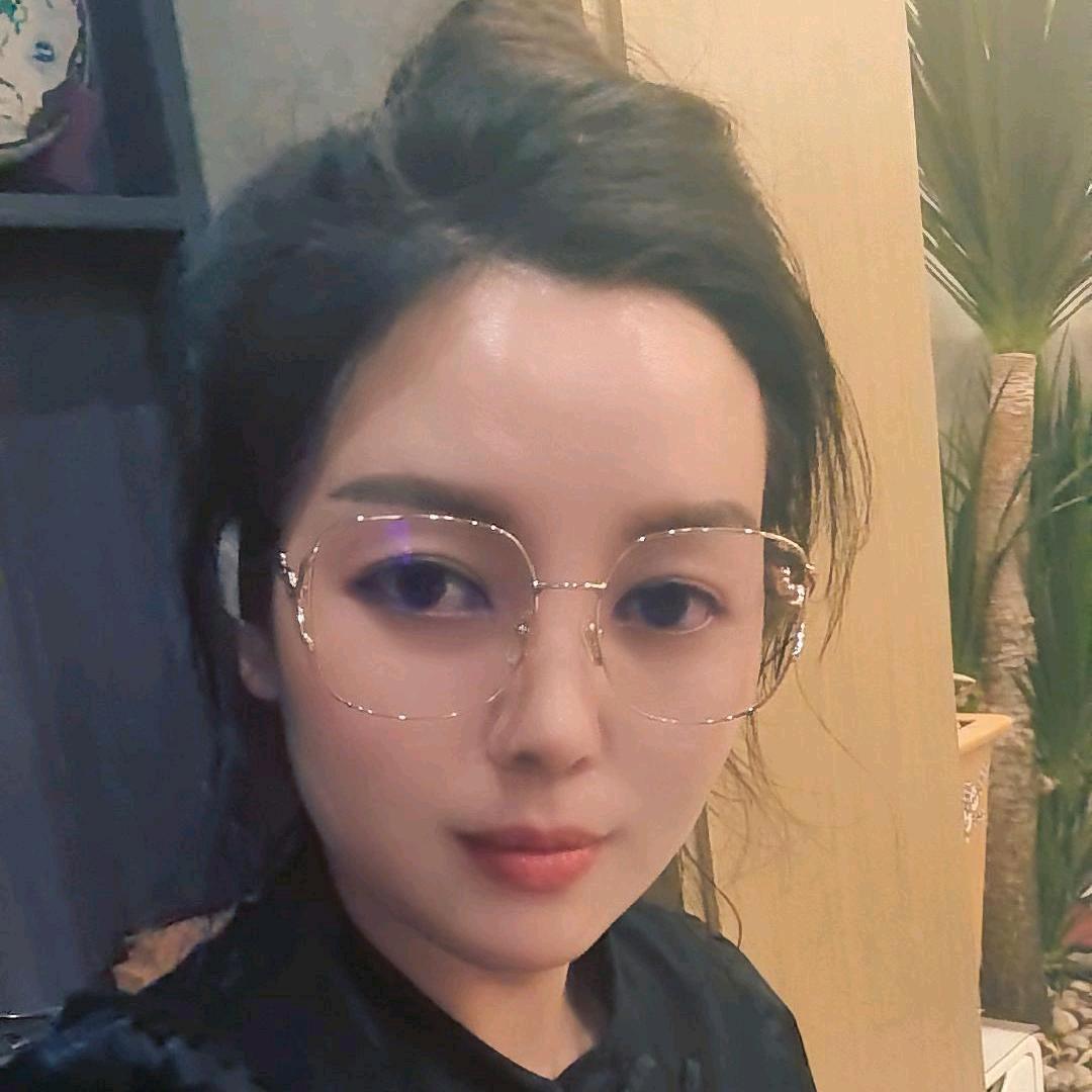 张国美