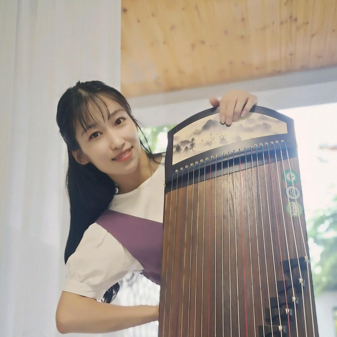 古筝不染